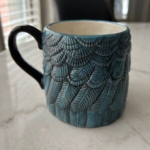 Embossed Feathers Blue Mug with Black Handle